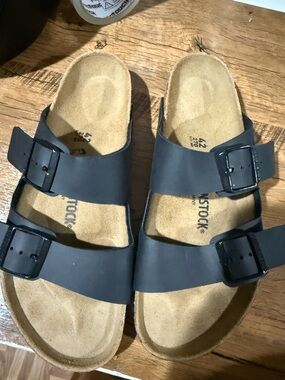 Birkenstock Arizona Two-Strap Sandals in Black and Tan